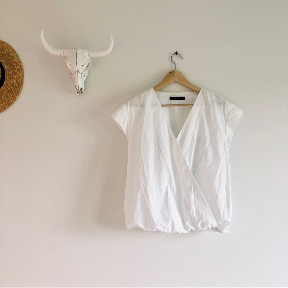 White crossover lace back detail oversize top